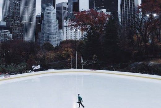 Man Ice Skating in city